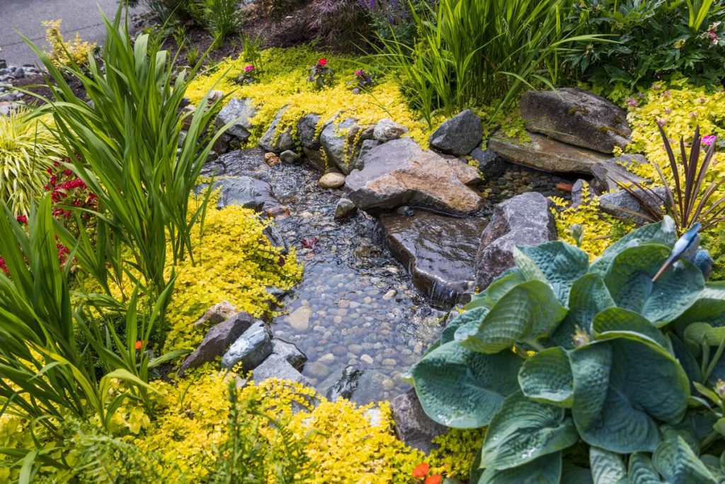 Aerial view of Newcastle deck with outdoor seating and landscaped yard