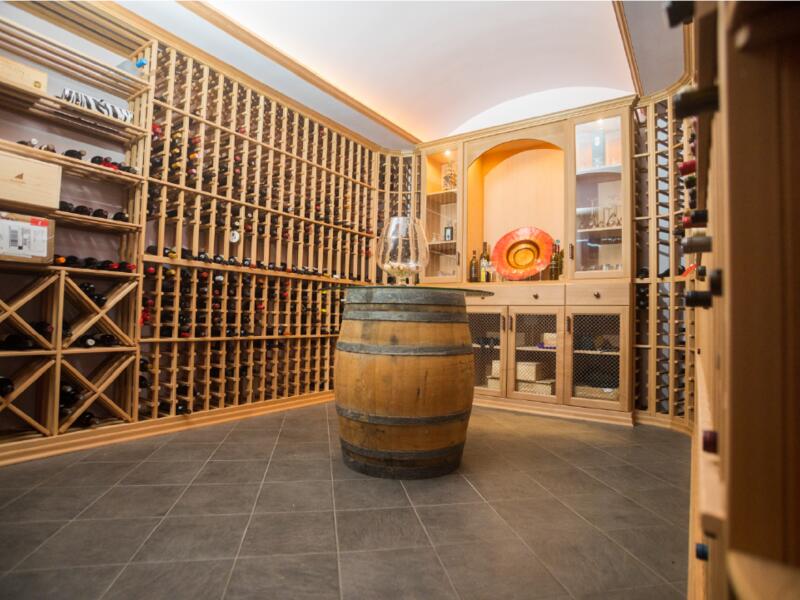 Wine cellar with wood racking and barrel table