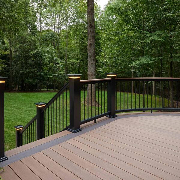 Curved composite deck with integrated rail lighting