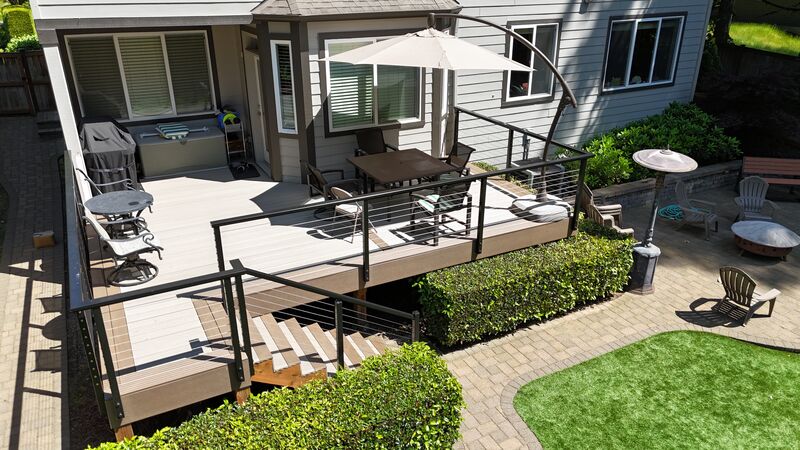 Deck resurfacing project with rail lights in Kirkland, WA